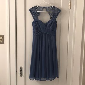 Knee length formal dress with lace shoulders